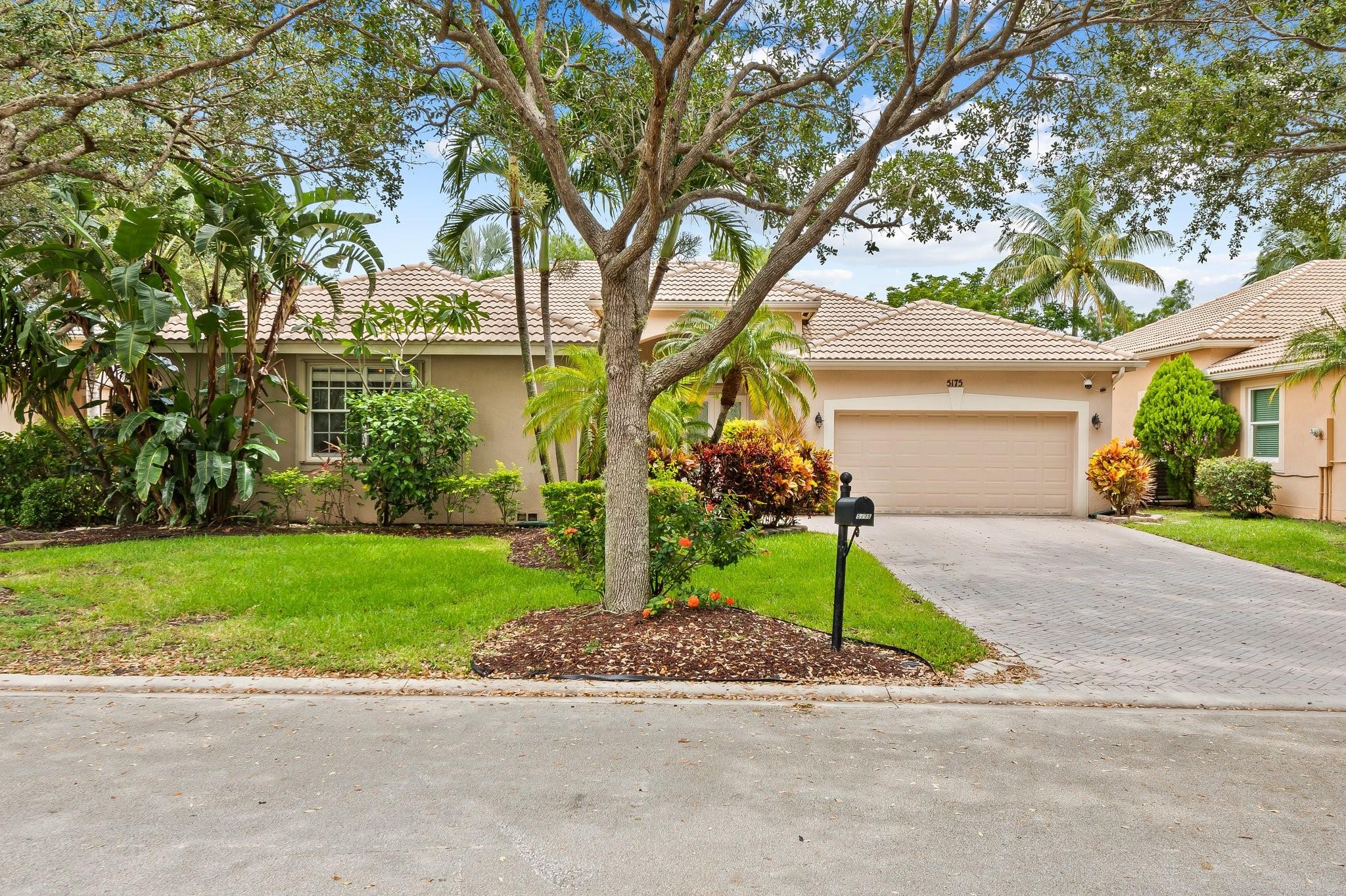Located on a quiet cul-de-sac in a gated, secure community, this lakefront pool home offers 4 bedrooms, 2 bathrooms, and a 3-car garage (with one bay currently used as a 5th bedroom). Enjoy a split floor plan, volume ceilings, updated kitchen, tile flooring, laundry room, and a heated saltwater pool with tranquil lake views. Recent upgrades include a 2017 AC and 2017 water heater. Accordion shutters for all windows. Ideally situated near major highways (Sawgrass Expressway, Florida Turnpike, and I-95) and just minutes to The Promenade at Coconut Creek, Tradewinds Park, Butterfly World, top-rated schools, grocery stores, and dining. A perfect blend of privacy, comfort, and convenience in the heart of Coconut Creek.