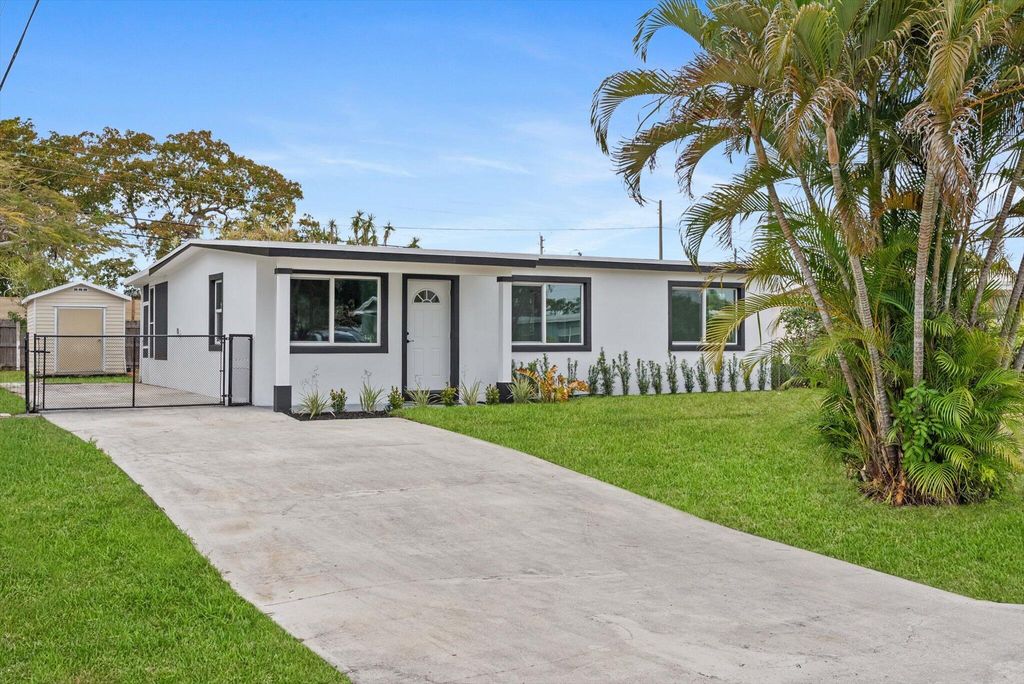 Photo of 5737 Honeysuckle Drive, West Palm Beach, FL 33415 (MLS # R11163497)