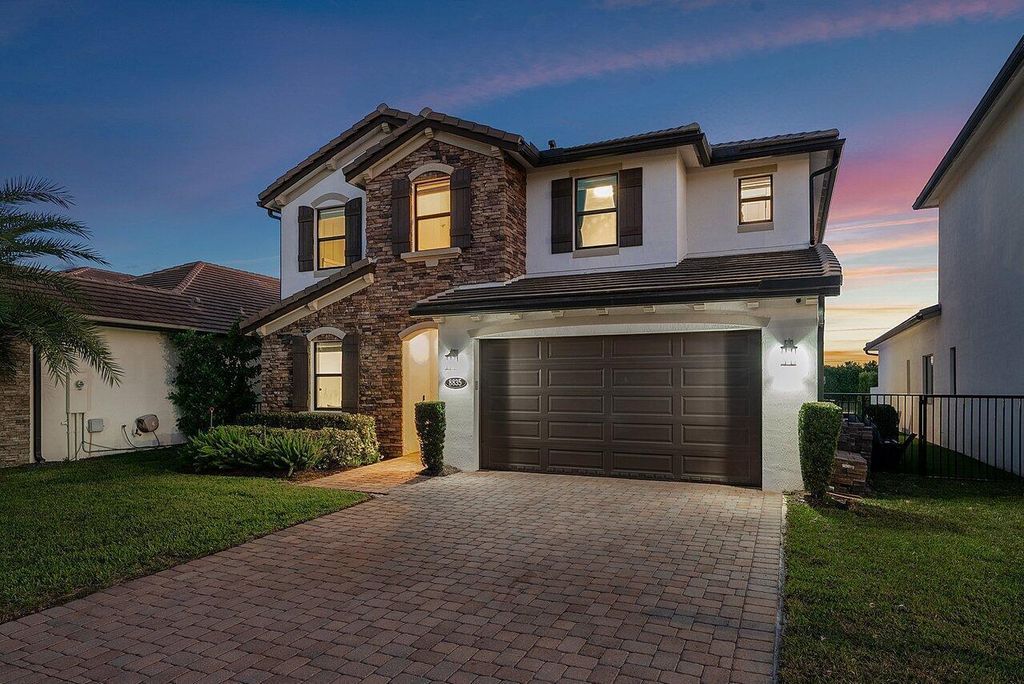 Photo of 8835 Grand Prix Lane, Boynton Beach, FL 33472 (MLS # B26009818)