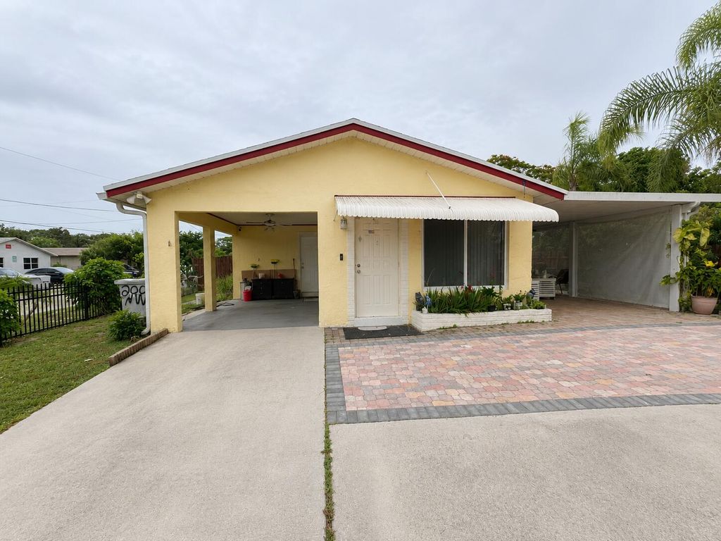 Photo of 200 NW 12th Court, Pompano Beach, FL 33060 (MLS # B26051357)
