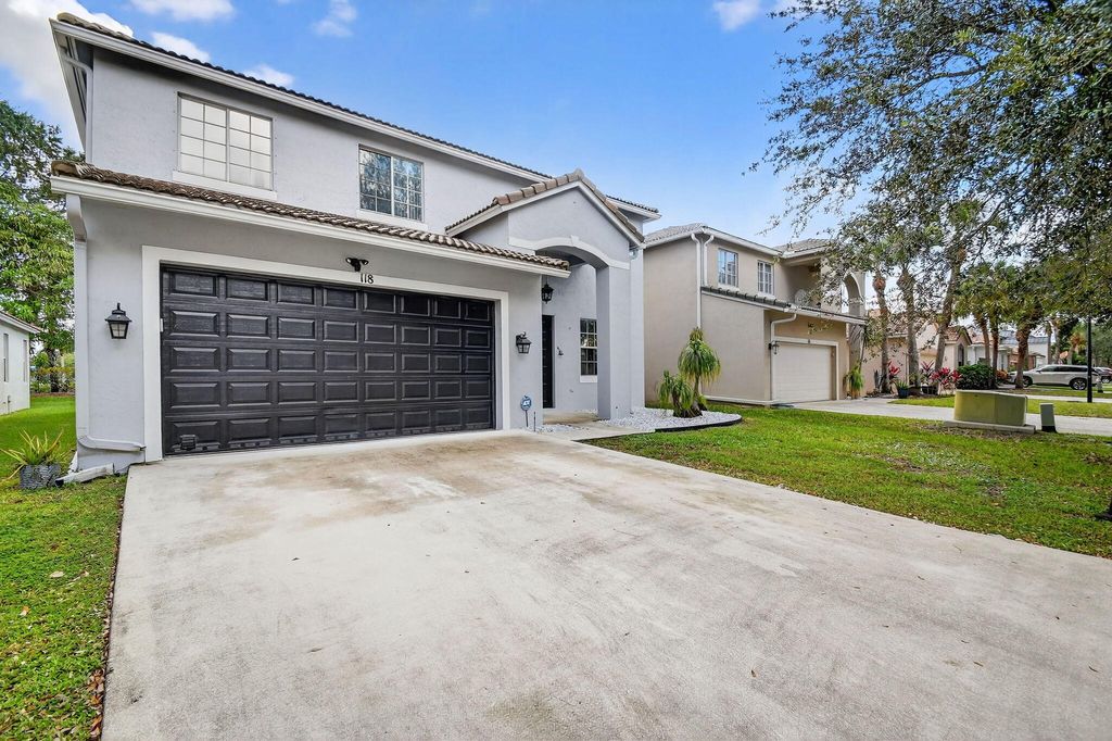 Photo of 118 Cayo Costa Court, Royal Palm Beach, FL 33411 (MLS # R11137045)