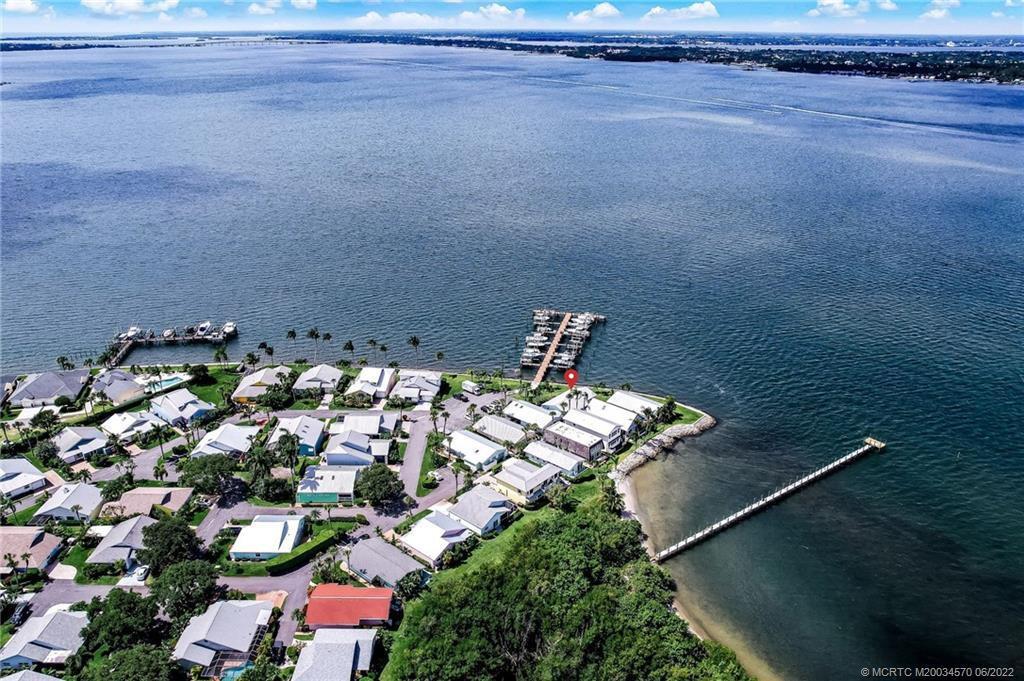 This stunning home comes with spectacular wide water views of the Indian River. Wonderfully located in the unique Key West style community of Indian River Point on Hutchinson Island. Just a Short bike ride, walk, or by vehicle it is a short distance to the Jensen Beach and Jensen Beach Causeway. The home as been updated with a nautical theme. Giving this home a relaxing vibe. Custom landscaping and water feature takes relaxing to another level inside and out. The community offers a heated community pool, Tennis court, & fishing dock. Best part about the fishing dock is its a stone throws away from your door. (Boat dock are privately owned and not for guest use; guest may fish off docks) Season rates vary. Off-Season: $6,500; Mid-Season: $8,900; Season:$12,500. (addtl taxes & fess apply)