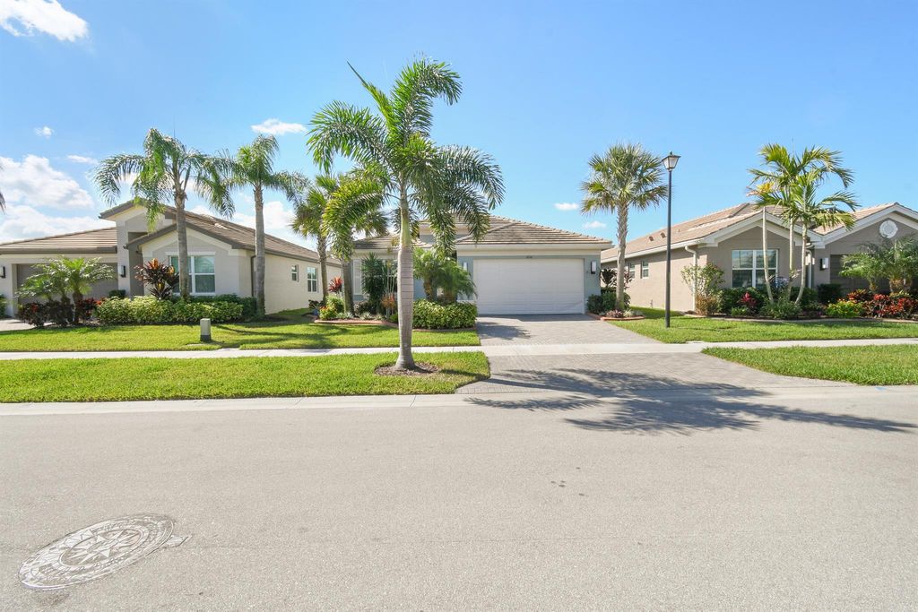 Photo of 12114 SW Jasper Lake Way, Port Saint Lucie, FL 34987 (MLS # R10971251)