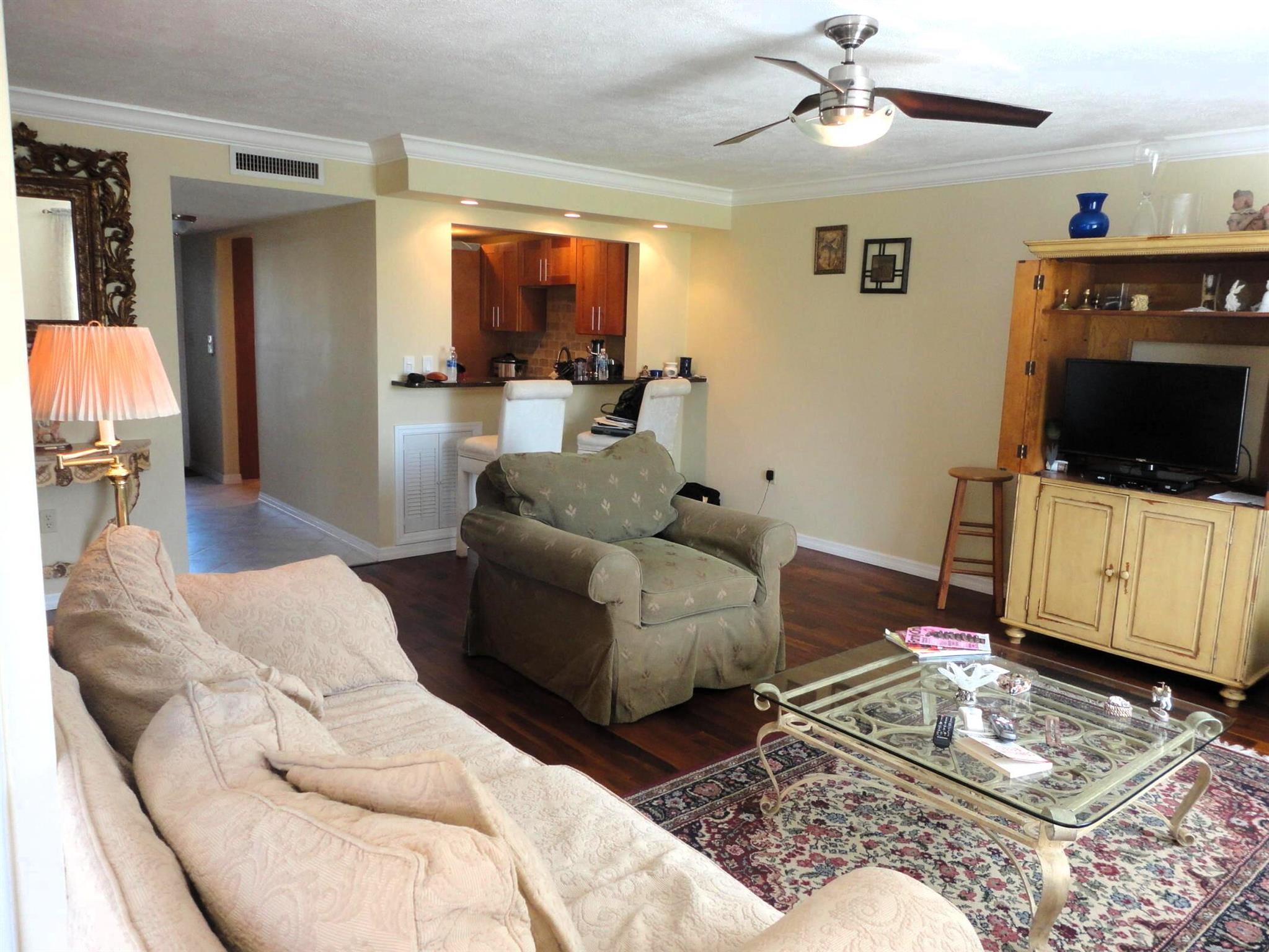 Beautifully remodeled ground floor unit in Miles Grant community, a few feet away from the pool. With gorgeous open view, updated kitchen and bathrooms, and tastefully furnished. Second open bedroom used as a den, with available pullout sofa that sleeps 2 adults. Wifi and cable included.