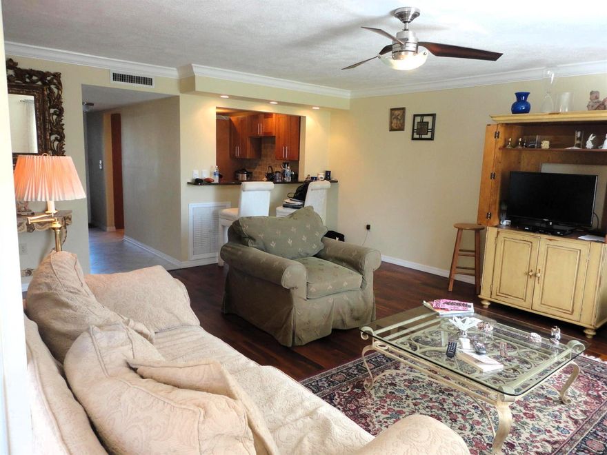 Beautifully remodeled ground floor unit in Miles Grant community, a few feet away from the pool. With gorgeous open view, updated kitchen and bathrooms, and tastefully furnished. Second open bedroom used as a den, with available pullout sofa that sleeps 2 adults. Wifi and cable included.