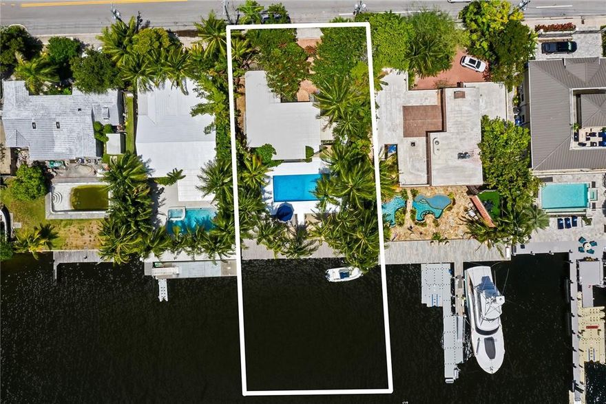 WATER, WATER and more WATER VIEW... everything you were dreaming for, just came true!  This perfectly positioned property provides unobstructed, East facing, deep water views, complete with gentle ocean breezes all year round.  Your resort style backyard is a private oasis that enjoys light all day from the moment the sun rises. Your new home and pool area look straight down the Middle River extension all the way to the Intracoastal Waterway and will provides you with the bright and happy life and lifestyle that you deserve!  BYOB.  Bring your own boat.