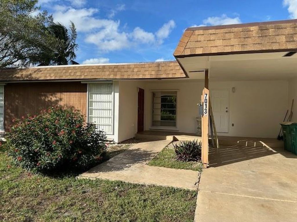 Photo of 7013 NW 63rd Court, Tamarac, FL 33321 (MLS # F10542696)