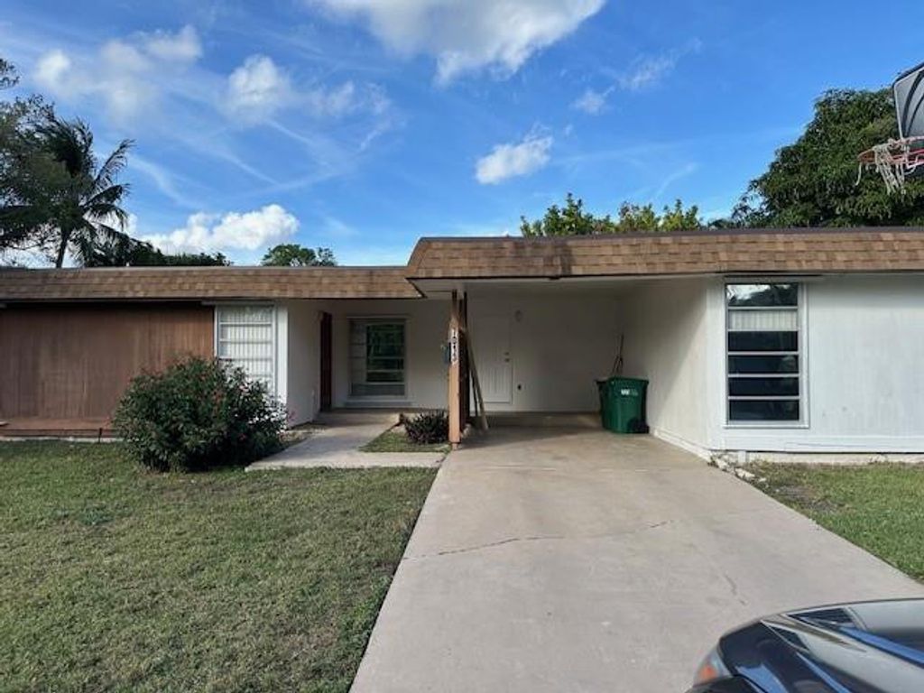 Photo of 7013 NW 63rd Court, Tamarac, FL 33321 (MLS # F10542696)