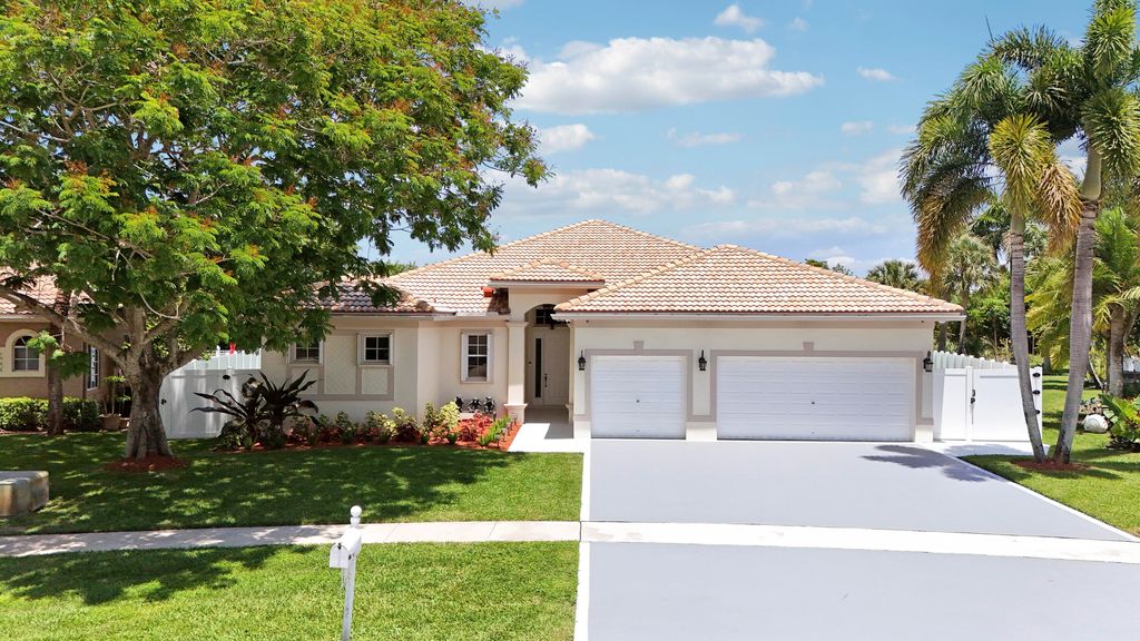 Photo of 10075 Freesian Way, Wellington, FL 33449 (MLS # B26025411)
