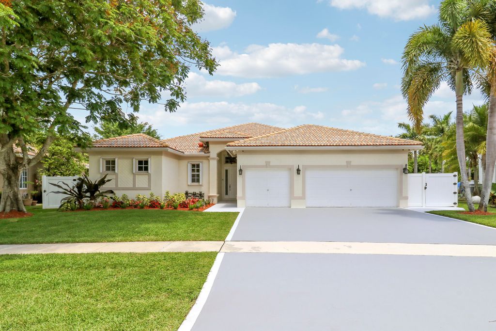 Photo of 10075 Freesian Way, Wellington, FL 33449 (MLS # B26025411)