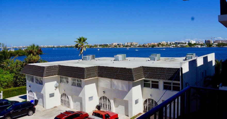 Waterfront Corner Unit with Stunning Intracoastal Views - Modern, Bright & Steps to the Beach! Welcome home to this beautifully updated 1-bedroom, 1-bath corner condo offering panoramic Intracoastal water views and an abundance of natural light from every angle. This bright and airy residence features sleek modern tile flooring, a renovated kitchen with contemporary finishes, and an updated bathroom designed for both comfort and style. The spacious layout maximizes the waterfront setting, creating a serene coastal atmosphere throughout. Enjoy your morning coffee or evening sunsets as boats glide by, all from the privacy of your own home. The building offers secure lobby entry for peace of mind along with a beautiful community pool overlooking the water--perfect for relaxing and soaking up the Florida sunshine. Located just minutes from Lantana Beach, the ocean, local restaurants, and vibrant coastal destinations, this condo offers the ideal blend of convenience and tranquility. Whether you're seeking a full-time residence, seasonal escape, or investment opportunity, this bright, modern waterfront retreat is a rare find. Don't miss your chance to experience coastal living at its finest!