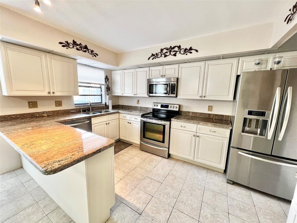 Photo of 8206 SW 23rd Court #22A, North Lauderdale, FL 33068 (MLS # F10491997)