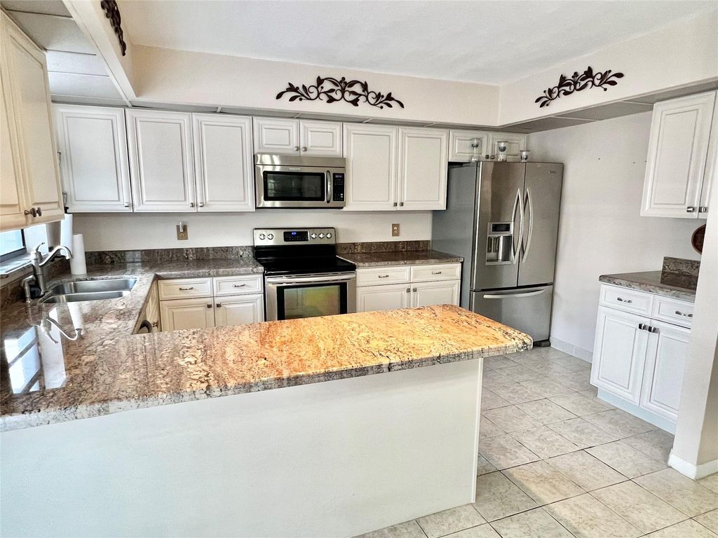 Photo of 8206 SW 23rd Court #22A, North Lauderdale, FL 33068 (MLS # F10491997)