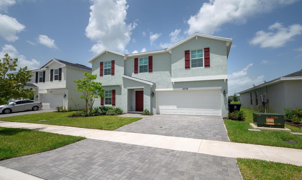 Photo of 6378 NW Windwood Way, Port Saint Lucie, FL 34987 (MLS # R11111692)