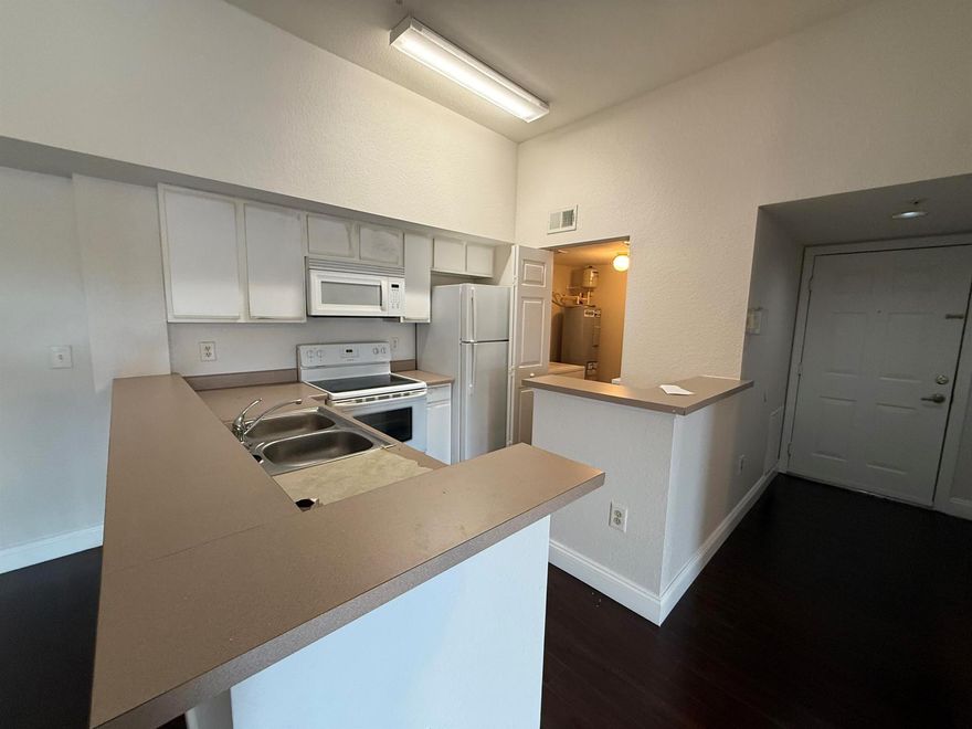 Move in ready! This 2/2 features wood laminated floor. Washer and Dryer in separate laundry room off kitchen. There is a separate locker storage room outside the front door. Unit will be professionally cleaned prior to final walk through. Unit is vacant and very easy to show. First, last and security required for move in. If you decide to apply, send proof of income, screenshot of credit score and copy of ID. Gated community with Clubhouse, pool, fitness center, picnic area and child playground. Must to see!!!