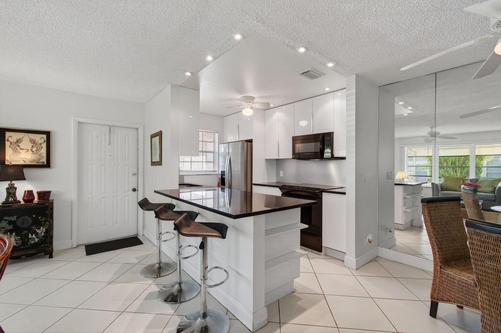 Photo of 1305 High Point Way SE #D, Delray Beach, FL 33445 (MLS # R11134726)