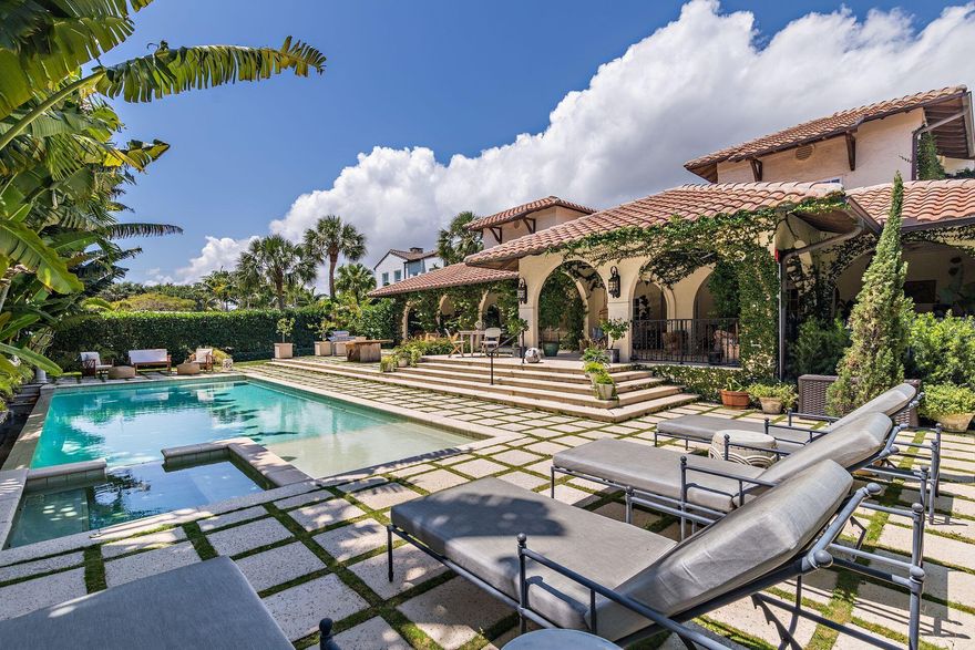 Beautiful SOSO Mediterranean Estate. This ultimate entertaining home is located steps from the Intracoastal Waterway. The 1918 estate is filled with many original Moorish architectural details throughout yet it's been updated and modernized to today's standards. The property consists of several gardens, an infinity pool, outdoor cold plunge pool, outdoor sauna and shower. The house sits on an oversized 17,424 sq. ft. lot. The outdoor covered loggia is over 1,200 sq. ft. and is ideal for entertaining. Soaring ceiling heights and several fireplaces create a magical setting that is unique to this 4 bedroom house. There is also room to expand. Additional features include: full house water filtration system, generator, impact windows and doors, 2 car garage, gym and outdoor lighting. a true family room. A 1200 square foot loggia with a living room and dining room overlooks the infinity edge pool an makes this home the perfect space for indoor/outdoor entertaining. There is still plenty of room for expansion. Exquisite Mediterranean and Moorish fixtures and tiles compliment so many of the original historic details that remain today.