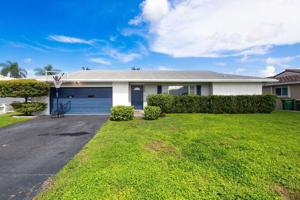 Photo of 9411 NW 74TH Place, Tamarac, FL 33321 (MLS # B26076051)