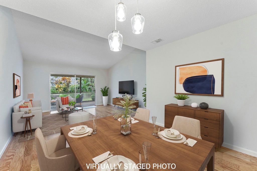 Photo of 115 Oakwood Drive, Jupiter, FL 33458 (MLS # R11065876)