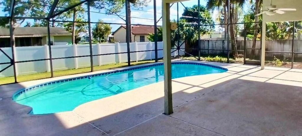 Photo of 2509 SW Abney Street, Port Saint Lucie, FL 34953 (MLS # R11037938)