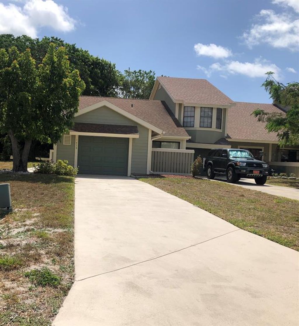 Photo of 1426 SE Colchester Circle Cir, Port St Lucie, FL 34952 (MLS # R10725539)
