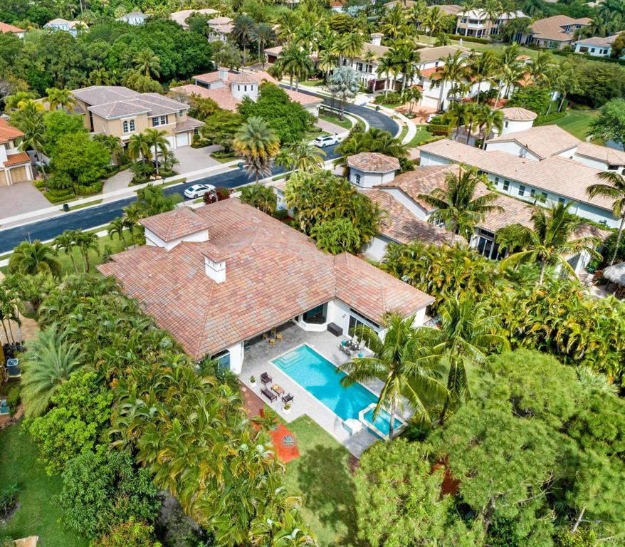 Model Perfect! San Michele, an exclusive gated enclave of 90 quality construction custom estate homes. One of the largest quiet private lots in the 24 hr manned gated community. Light Bright one story contemporary home. Cul de Sac location. 4 large bedrooms/4 1/2 baths plus office. 3 Car Garage. Walls of glass let the outside in. Unsurpassable upgrades. Saturnia floors throughout main living areas, wood floors in bedrooms, volume ceilings, walkin custom closets, Chefs kitchen. Large MBR suite w/2 walkin closets. Luxurious master bath w/dual sinks, custom cabinetry, large shower w/seamless glass doors, sunken tub. Lush mature landscaping and gardens surround resort style pool/spa. 2 NEW A/C. NEW hot water tank. Low HOA. Community offers fitness ctr, pool, HarTru tennis courts, clubhouse