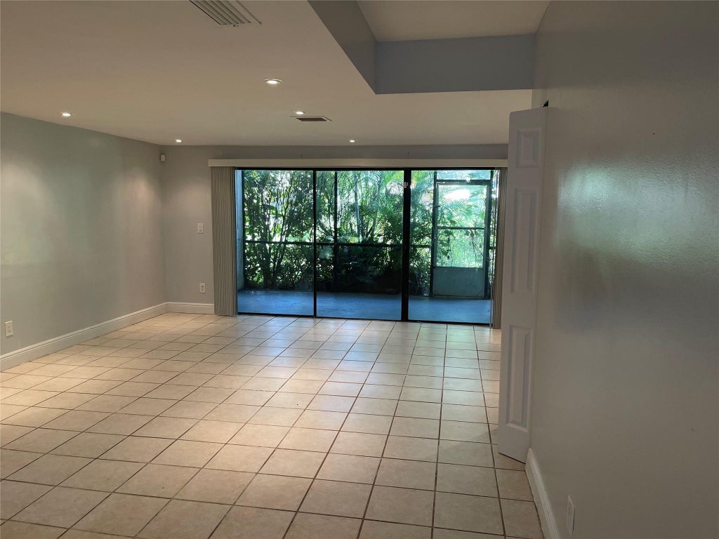 Photo of 8843 SPRINGTREE LAKES Drive, Sunrise, FL 33351 (MLS # B26062801)