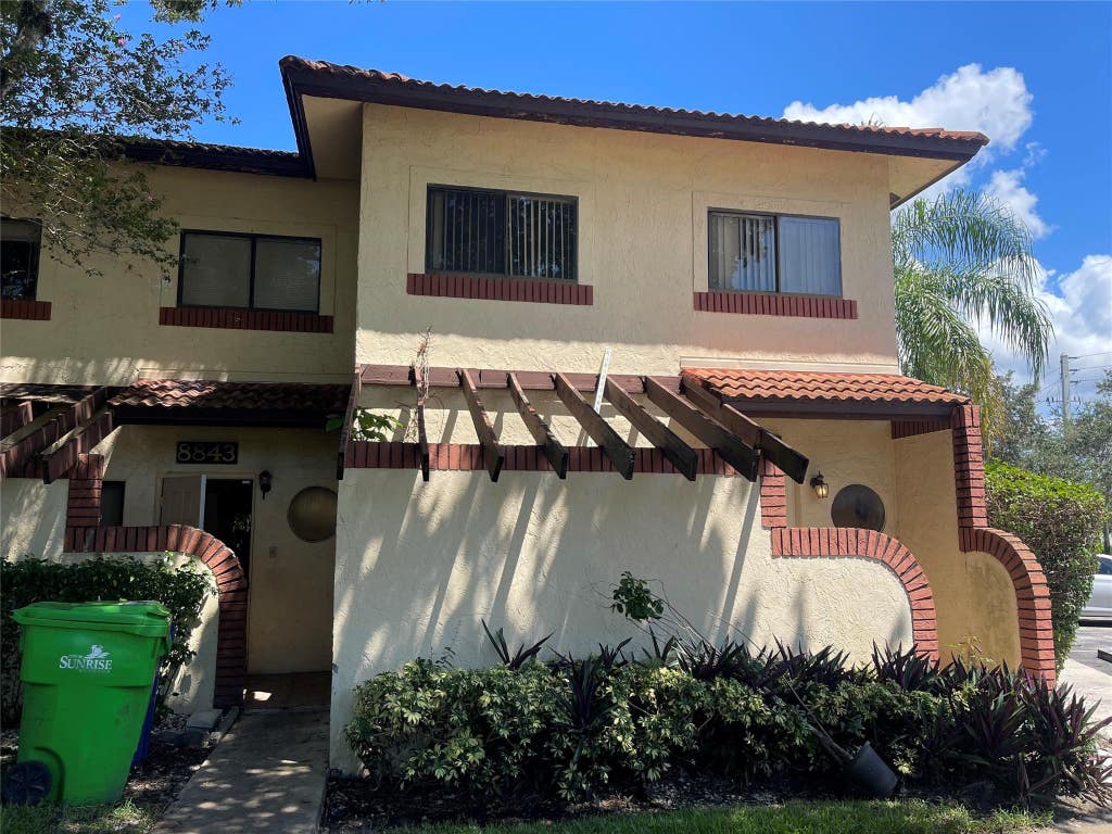 Photo of 8843 SPRINGTREE LAKES Drive, Sunrise, FL 33351 (MLS # B26062801)