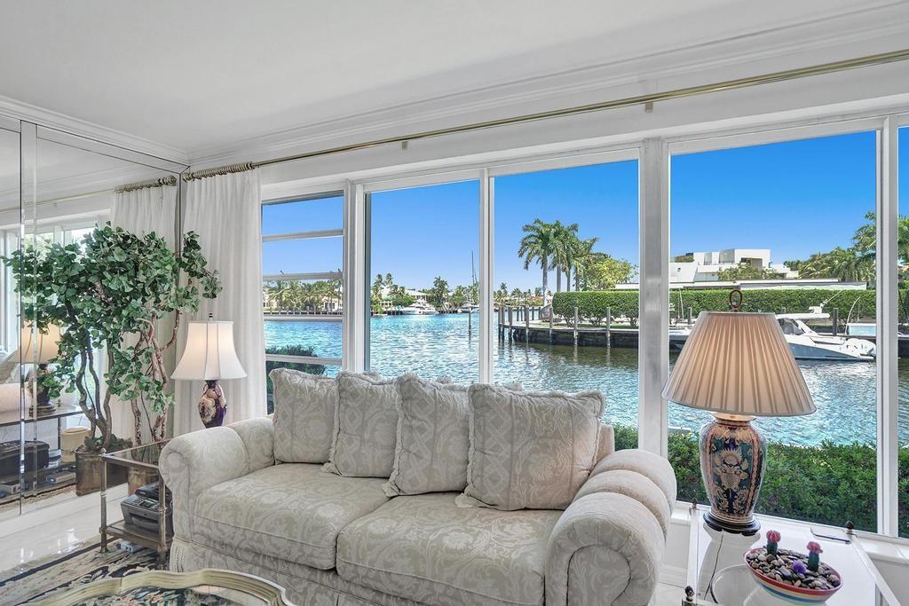Waterside fully furnished spacious 2 BR 2 BA Condo for rent at $3950 per month. Nestled at the very tip of Fort Lauderdale's exotic Isle of Venice -and ideally located between the beach and LAS OLAS, this condo features luxurious indoor & outdoor space close to the beach and scores of restaurants & shops. Unbeatable water views amid whispering palms! This a mid century modern villa, features upgraded Kitchen with natural gas stove/ oven, dishwasher, stone counters, stainless appliances and large side by side fridge. With both a private patio, and dockside lounging, the community also features a large heated swimming pool and covered parking, central A/c, fully furnished traditional decor with full size washer/dryer in the unit. $3,950 per month annual or negotiable for the season.