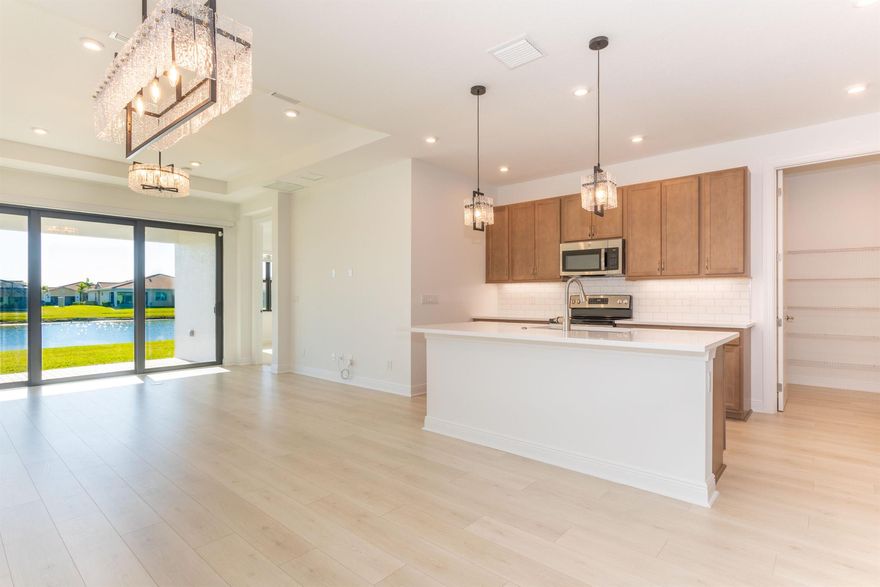 Located in the gated PGA Village Verano community, this bright and spacious 2-bedroom, 2-bath PLUS OFFICE/DEN villa boasts beautiful lakefront setting with eastern exposure. The home offers abundant natural light and generous interior space, perfect for comfortable living and entertaining. You can enjoy Club Talavera!!