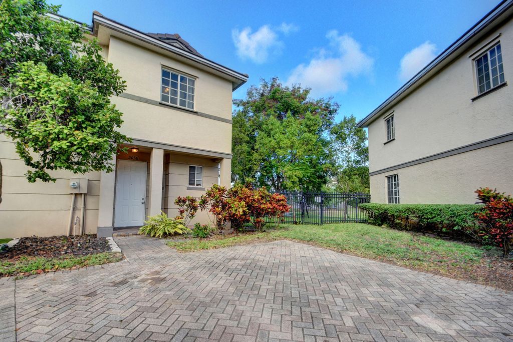 Photo of 2036 Marsh Harbor Drive, West Palm Beach, FL 33404 (MLS # B26028348)