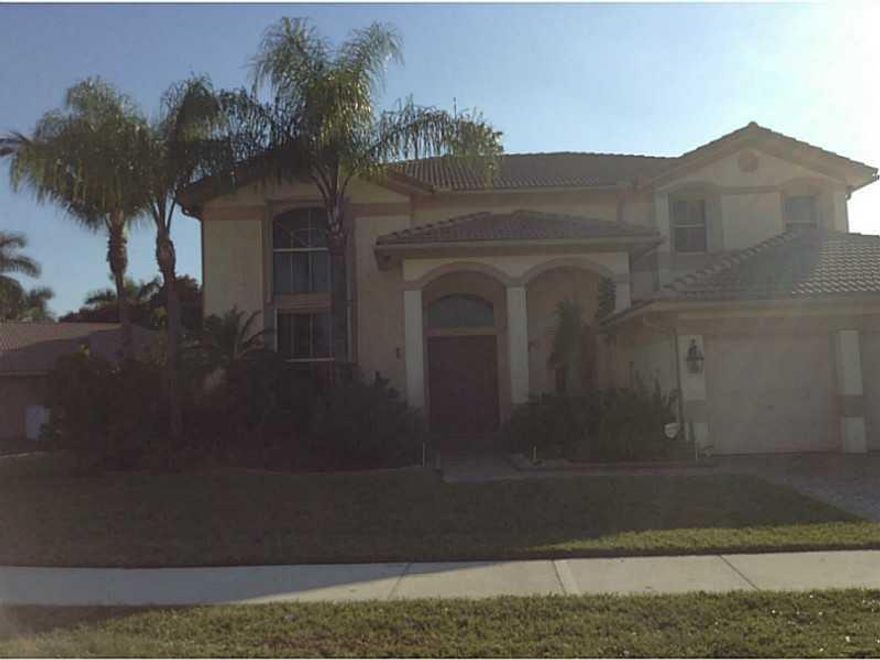 Amazing buy awaits you in the Ridges.  Guard gated, private community, featuring the Windsor model with an open floor plan. 5 Bedrooms 4 Baths, 3 Car Garage.  Kitchen with Stainless Steel Appl, One Full Bedroom downstairs.  Large patio and pool