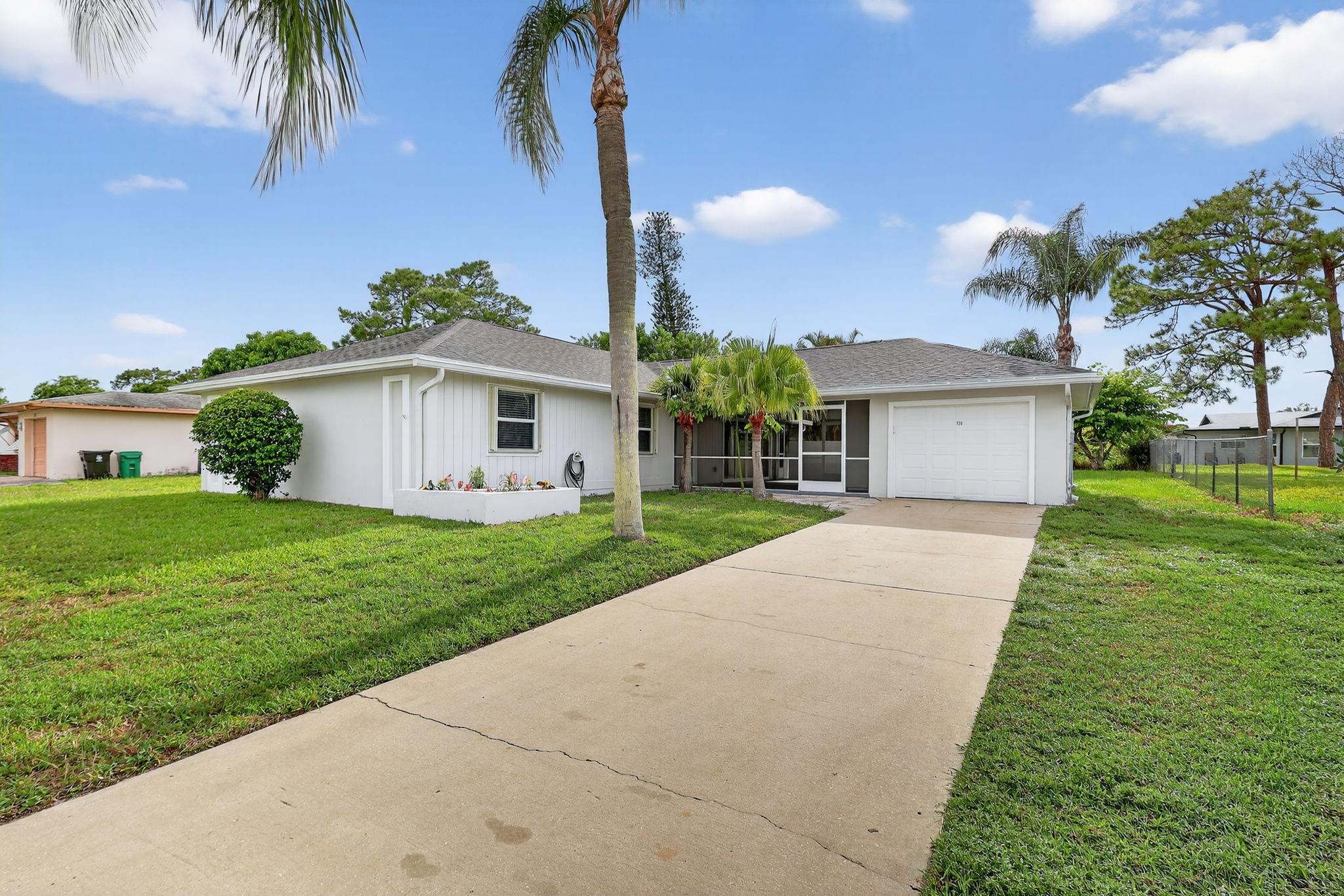 Spacious newly remodeled 3 bedroom 2 bathroom home with lots of upgrades. Large kitchen with new cabinets and quartz countertops. The kitchen flows nicely into a large screened front porch great for large gatherings or enjoying a cup of morning coffee. Newly painted interior and updated appliances. Every room is bright with nice windows. Enjoy a large backyard with a screen covered lanai. This home has so much to offer and lawn care is included in the rent. Centrally located near Turnpike, I-95 and US HWY-1. Close to St. Lucie West for fine dining, shopping, sports stadium, hospitals & schools. Also close to Sportsman's park under 1 mile away and US1 under 3 miles with plentiful businesses, Mid-Florida Event Ctr. and Jensen Beach.