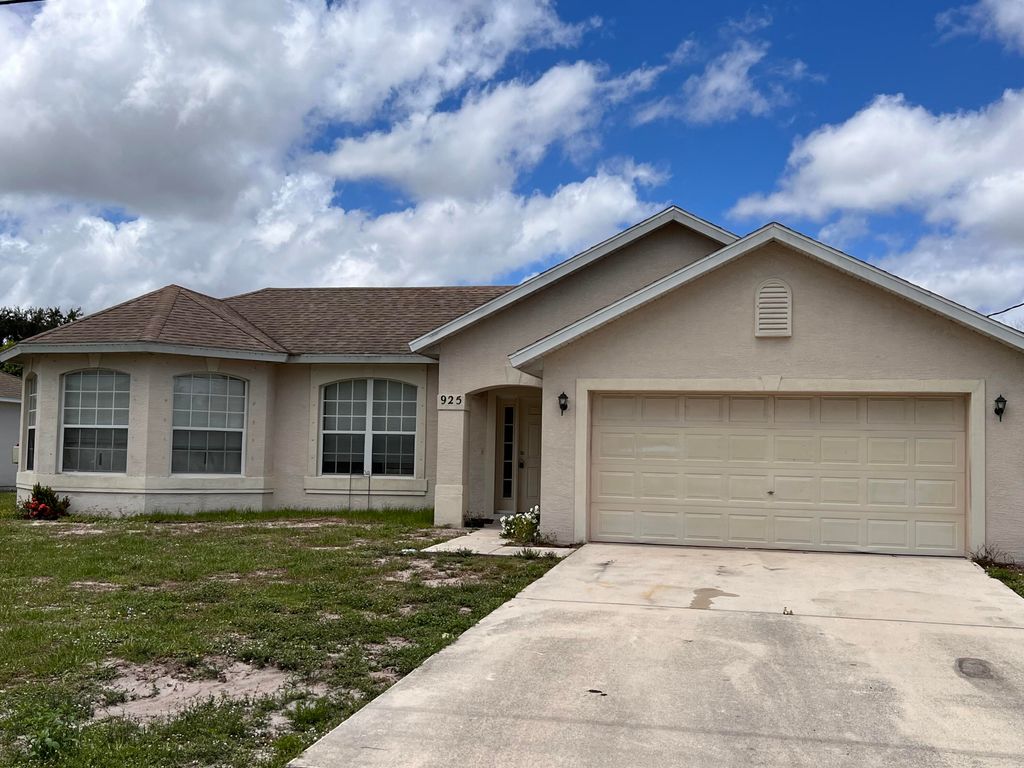 Photo of 925 SW Mcdevitt Avenue, Port Saint Lucie, FL 34953 (MLS # R10805784)