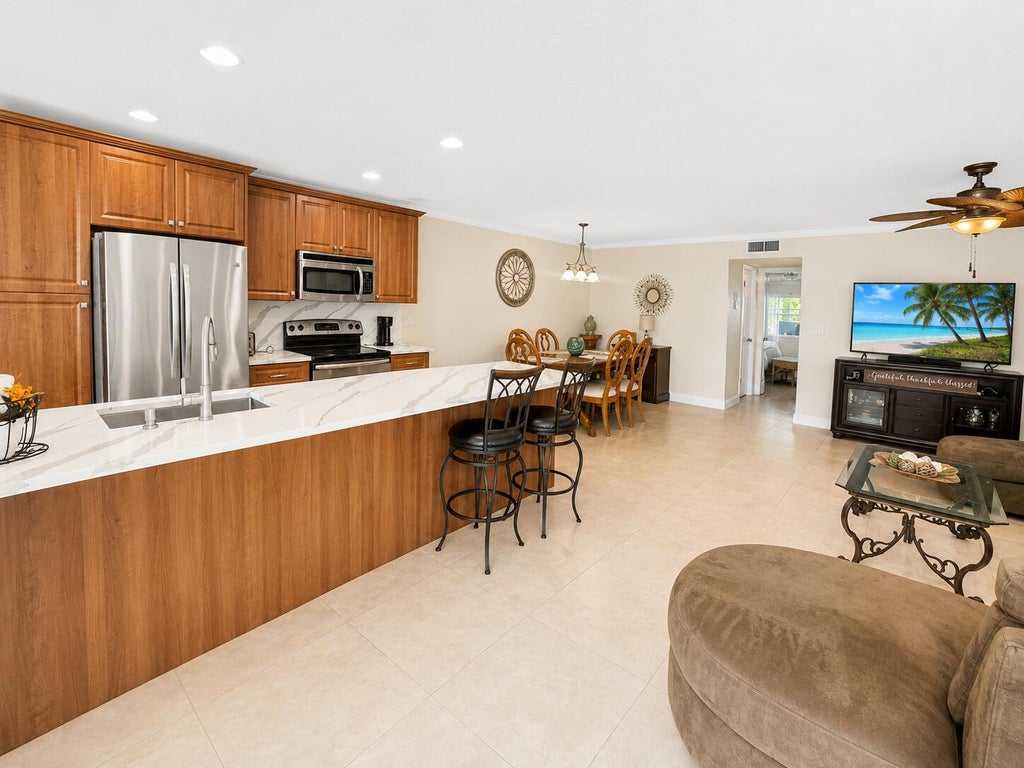 Photo of 512 High Point Drive #C, Delray Beach, FL 33445 (MLS # B26059633)