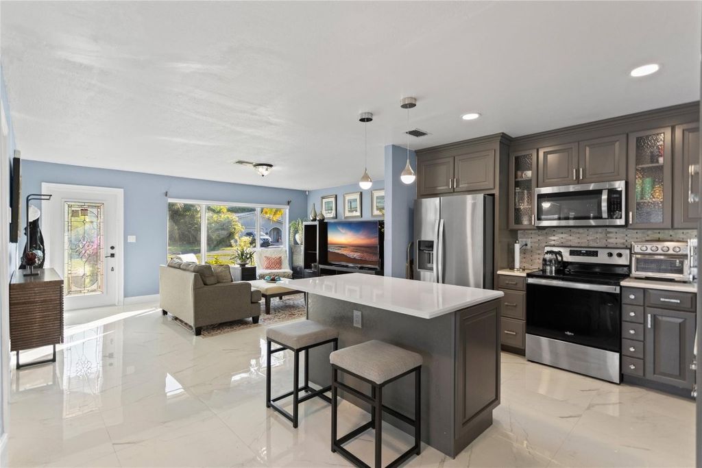 Photo of 11305 NW 38th Street, Coral Springs, FL 33065 (MLS # F10540127)