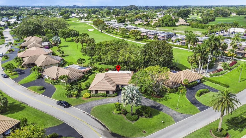 Photo of 133 Clubhouse Boulevard, Atlantis, FL 33462 (MLS # R10971936)