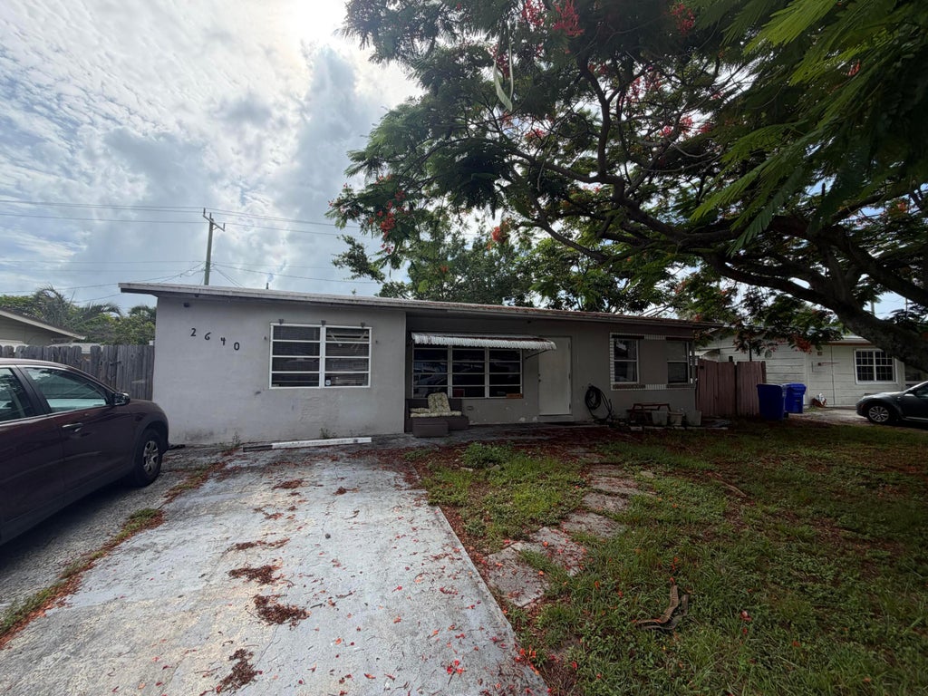 Photo of 2640 NE 8th Terrace, Pompano Beach, FL 33064 (MLS # B26045451)