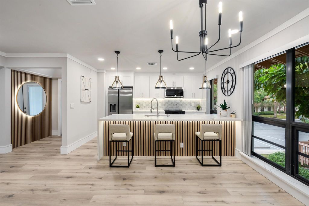 Photo of 219 Brackenwood Terrace, Palm Beach Gardens, FL 33418 (MLS # R11052006)