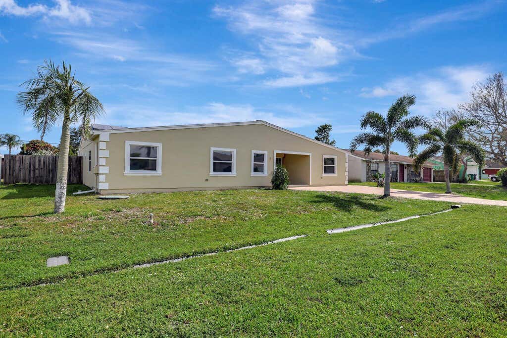 Photo of 1711 SE Fallon Drive, Port Saint Lucie, FL 34983 (MLS # R11061915)