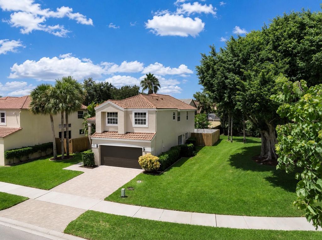 Photo of 7701 NW 61st Terrace, Parkland, FL 33067 (MLS # B26027268)