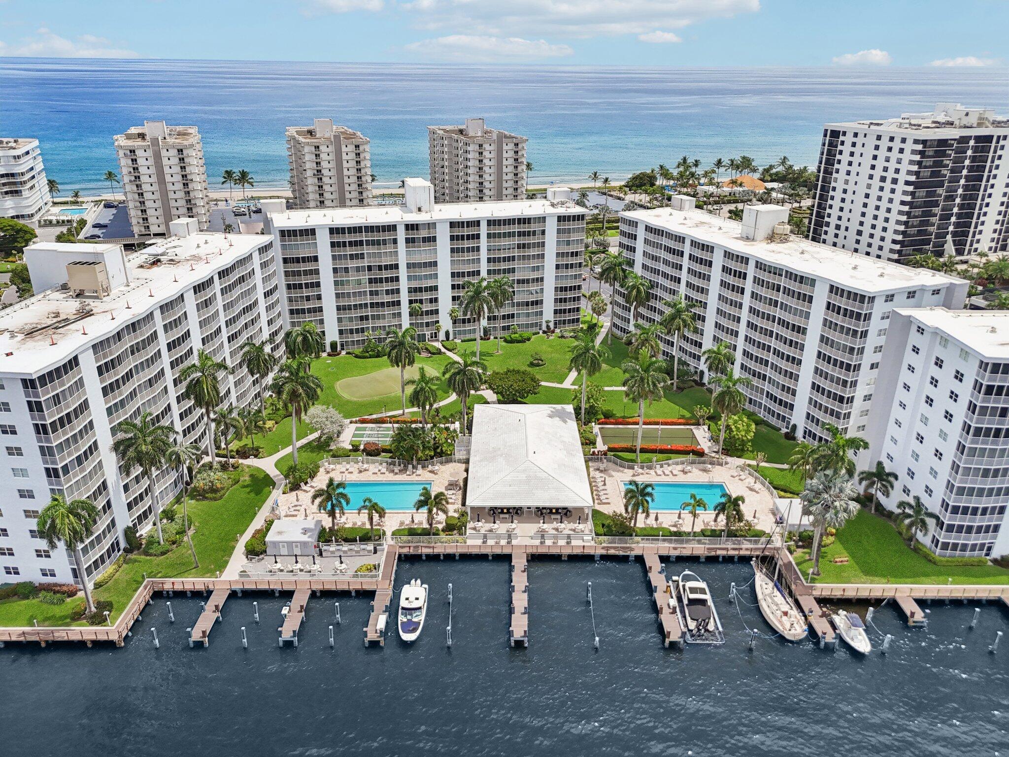 Experience the allure of refined coastal living in this beautifully designed two bedroom, two bath residence, perfectly situated between the intracoastal and ocean. This is one of Highland Beach's most prestigious 55+ communities, Seagate of Highland. Nestled along the intracoastal just off A1A, this first floor condominium offers the rare convenience of direct patio access, creating a graceful connection between sunlit interiors and the serene outdoor surroundings.Every detail of the community has been thoughtfully cared for, with the milestone inspection and reserve study complete. Recent enhancements include concrete restoration, new roofs and elevators. Inside, the home features impact glass and open living spaces that are bright, airy, and perfect