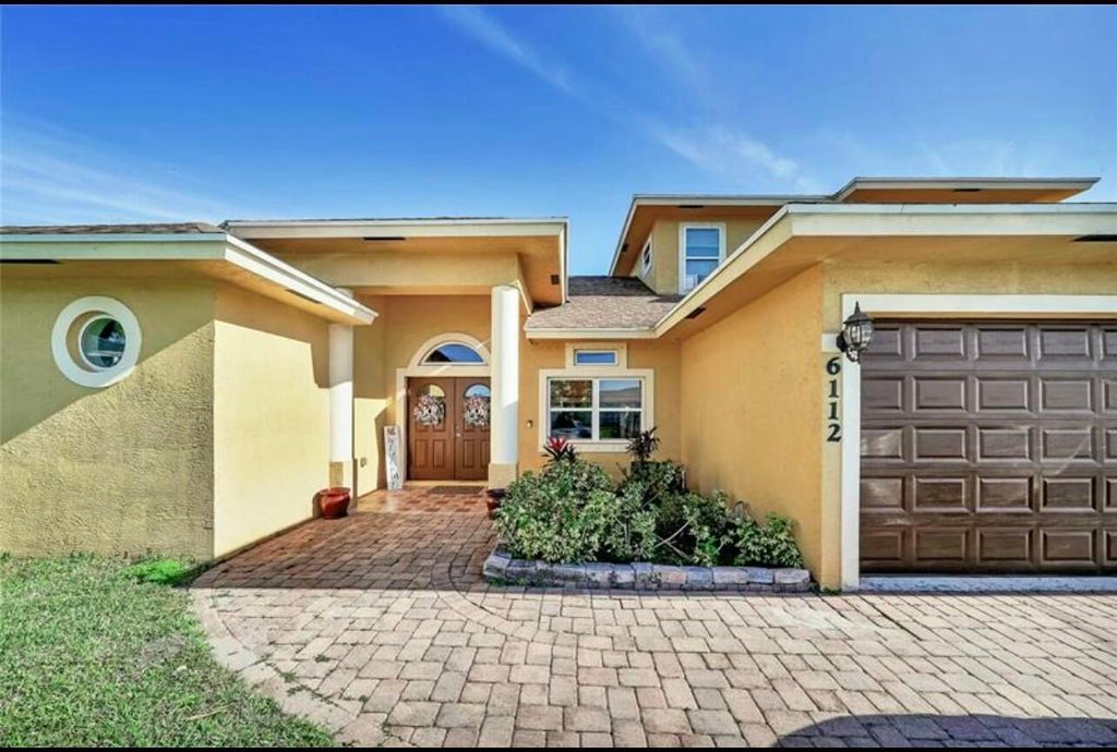 Photo of 6112 NW Ginger Lane, Port Saint Lucie, FL 34986 (MLS # B26013385)