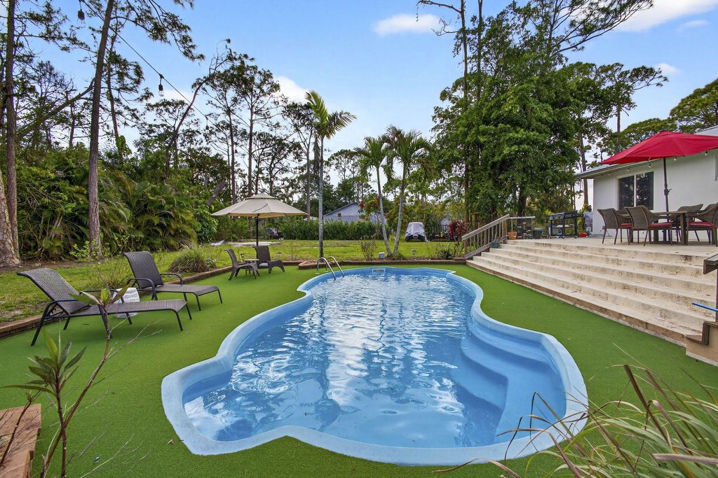 Photo of 12944 N 68th St Street N, The Acreage, FL 33412 (MLS # B26010864)