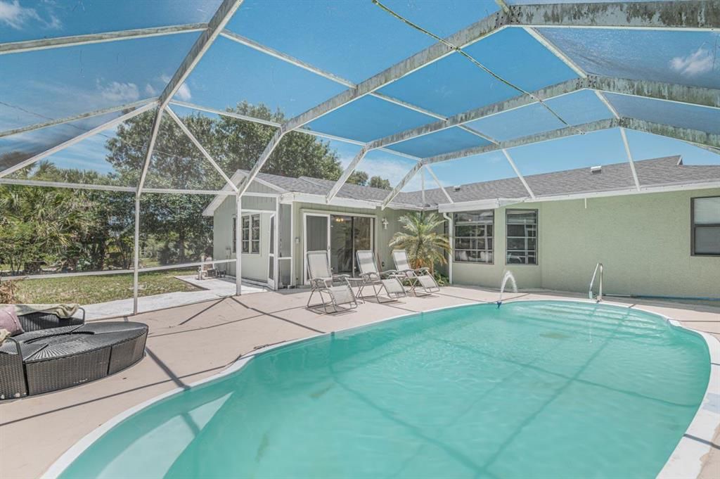 Photo of 341 NE Genesee Avenue, Port Saint Lucie, FL 34983 (MLS # R10722711)