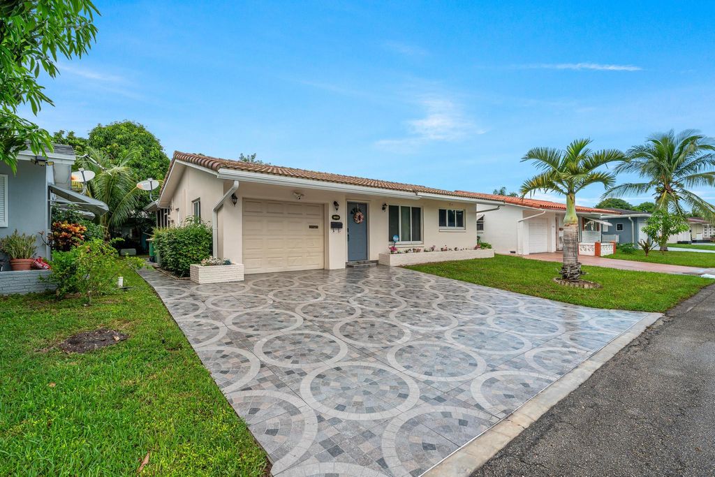 Photo of 4915 NW 52nd Court, Tamarac, FL 33319 (MLS # R11128883)