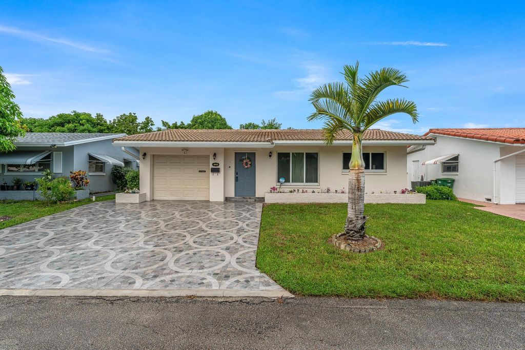 Photo of 4915 NW 52nd Court, Tamarac, FL 33319 (MLS # R11128883)