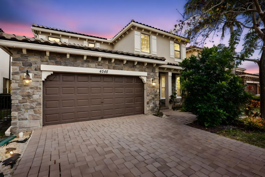 Welcome to Gulfstream Preserve! This beautifully maintained 2-story home offers 2,277 sq ft of living space with 4 bedrooms and 3 full bathrooms, designed for both comfort and functionality.

The main living areas feature tile flooring, while all bedrooms are carpeted for added warmth and comfort. The spacious kitchen comes equipped with appliances and showcases an island with bar seating, perfect for casual meals and entertaining. A dedicated laundry room includes a washer and dryer for added convenience.

Enjoy numerous recent upgrades, including 2025 improvements: new AC, washer and dryer, refrigerator, ceiling fans, and fresh landscaping. Additional 2022 upgrades include hurricane protection, dishwasher, microwave, and stove/oven, providing peace of mind and modern efficiency. Step outside to a fenced backyard with both covered and open patio spaces, ideal for relaxing or hosting gatherings. The home also features panel shutters for added storm protection.

Don't miss this opportunity to own a move-in-ready home with major updates already completed in the desirable Gulfstream Preserve community!