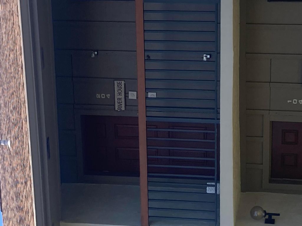 Photo of 1600 SE Dixie Highway #13-204, Jensen Beach, FL 34957 (MLS # R11132848)