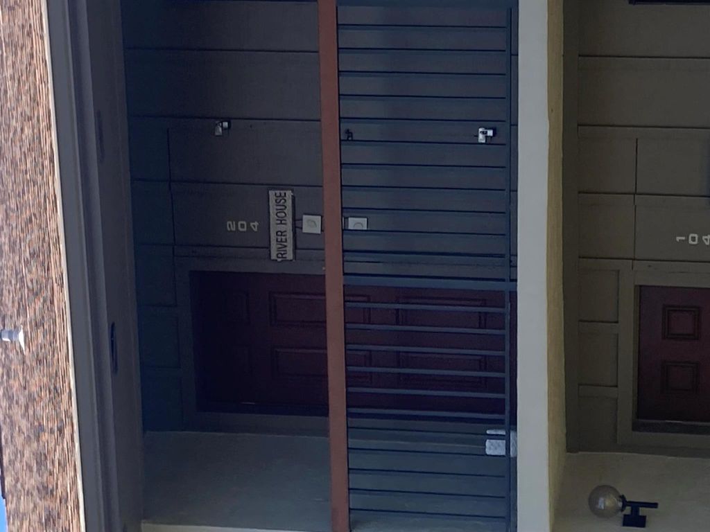 Photo of 1600 SE Dixie Highway #13-204, Jensen Beach, FL 34957 (MLS # R11132848)